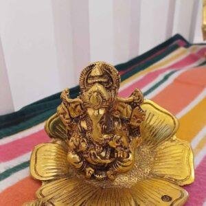 Metal Lord Ganesh On Flower for Puja Ganesha Vastu Figurine 12X10X7 cm Golden